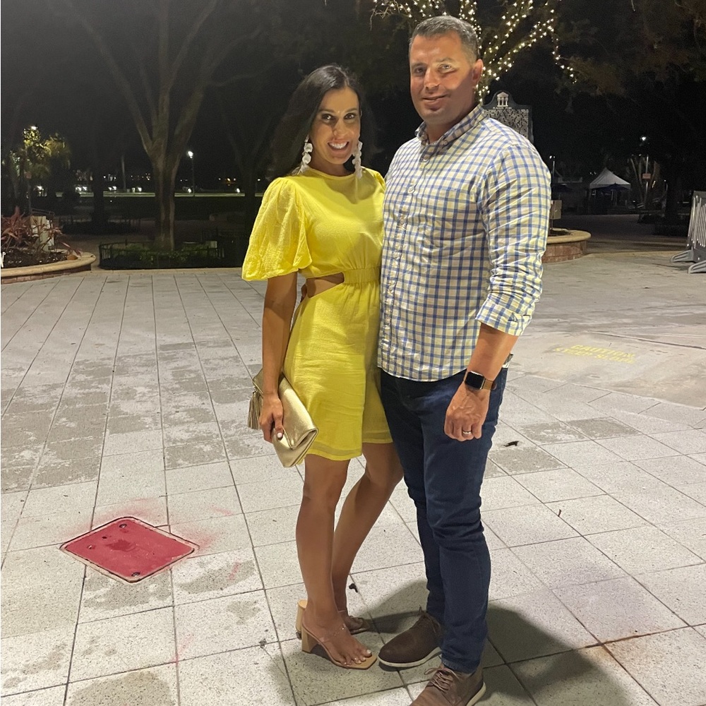 Shine bright in this yellow cutout dress!